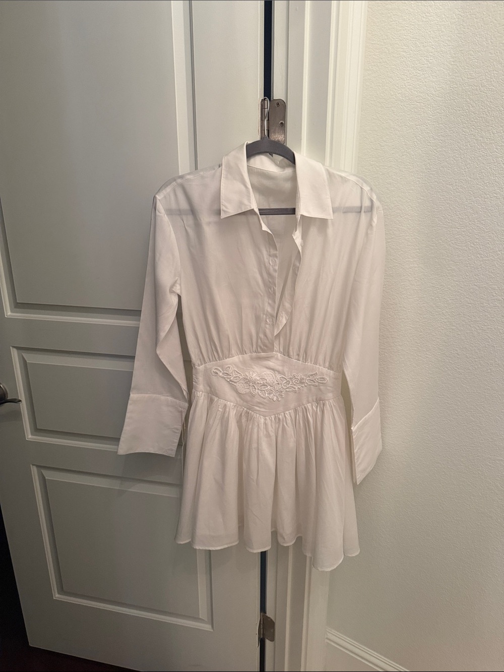 White Peplum Tunic with Embroidered Waist